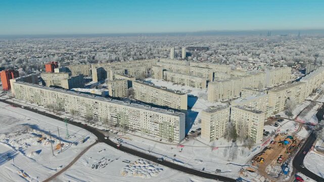 Frosted apartment blocks form geometric courtyards across wintry Riga in Latvia