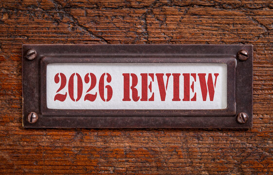2026 review - a label on grunge wooden file cabinet. A passing year evaluation, summary and review concept.
