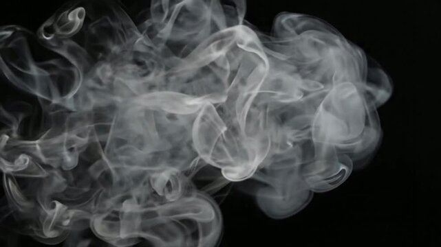 Abstract white smoke swirls on black background, slow motion flowing vapor overlay for cinematic visual effects and motion