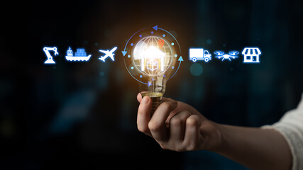 A hand holds a glowing light bulb representing creativity and innovation in various fields such as logistics, delivery systems, and technology solutions, illustrating modern business concepts. Nascent © InfiniteFlow