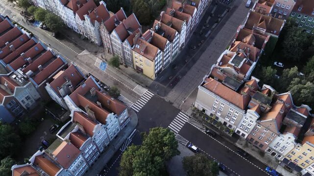 Aerial view of historic street intersection with crosswalks and traditional buildings in the city center of Gdansk, Pomeranian Voivodeship, Poland.