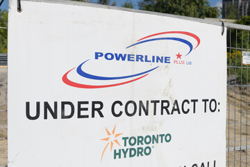 Fototapeta premium banner with sign for Powerline Plus, a utility contractor, (based in Scarborough), Toronto