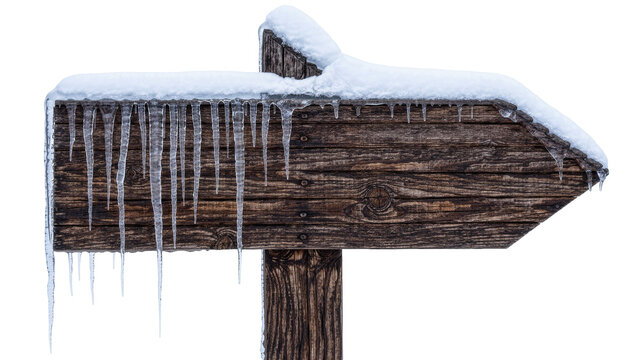 Wooden directional signpost covered in snow and icicles, isolated on transparent background