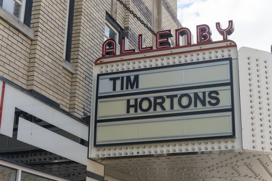 exterior building sign of Allenby Theatre (The Roxy Theatre), designed by Kaplan & Sprachman in Art Deco style, now location of Tim Hortons, 1195 Danforth Av, Toronto