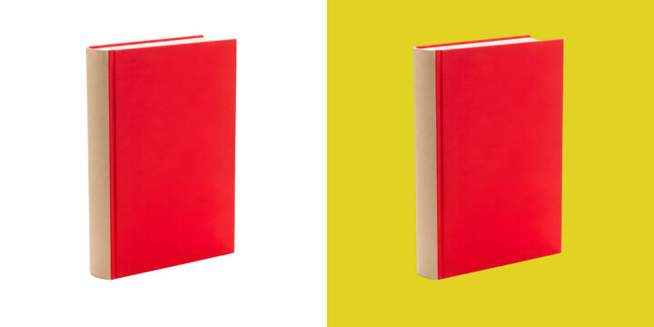 Red book standing upright on a desk