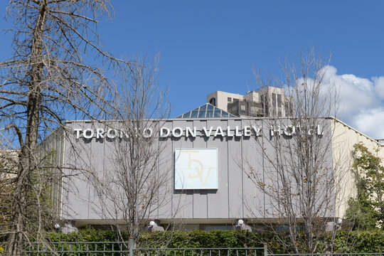 exterior building facade and sign of Toronto Don Valley Hotel & Suites, a 3-star hotel, located at 175 Wynford Dr (North York), Toronto