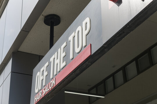 sign outside Off The Top Hair Salon located at The Three Sixty, 366 Bloor St E, Toronto
