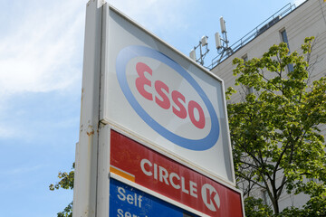 Obraz premium roadside pylon sign at Esso, a gas station, located at 553 Lake Shore Blvd W, Toronto