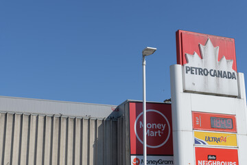 Obraz premium roadside pylon sign at Petro-Canada, gas station, located at 1750 Bloor St W (and Keele St), Toronto