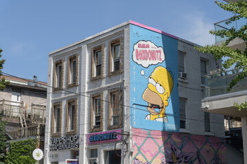 Obraz premium cartoon mural outside 6ix Donutz located at 83 Portland St near King W, Toronto