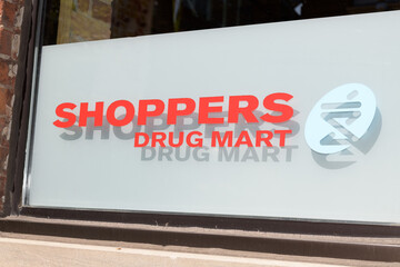 Obraz premium vinyl window sign at Shoppers Drug Mart, a pharmacy chain, located here at 500 King St W, Toronto