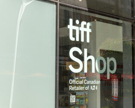 vinyl window sign of tiff the Shop at TIFF Lightbox, a movie theatre, located at 350 King St W, Floor 1 of the Festival Tower, Toronto