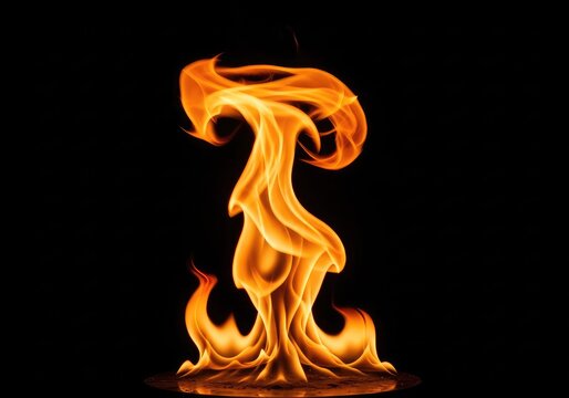 Vibrant orange and yellow fire flames dancing intensely against a solid black backdrop. Dramatic light and shadow create a powerful energy, bonfire, natural, embers