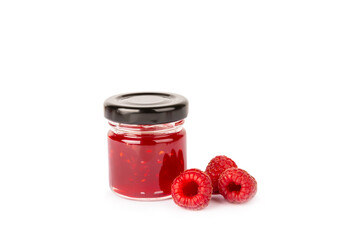 A jar of raspberry jam isolated on white background. A bowl of sweet berry jam. fruit spread texture, red jam splatter, organic dessert topping. clipping path © Avocado_studio