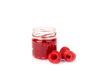 A jar of raspberry jam isolated on white background. A bowl of sweet berry jam. fruit spread texture, red jam splatter, organic dessert topping. clipping path © Avocado_studio