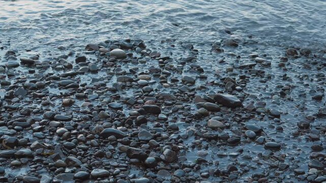 waves crashing over rocks