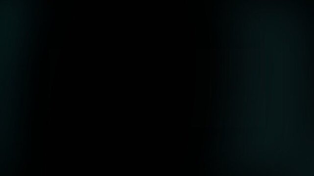 Vertical white smoke plumes rising against a black background. 4K. Loop