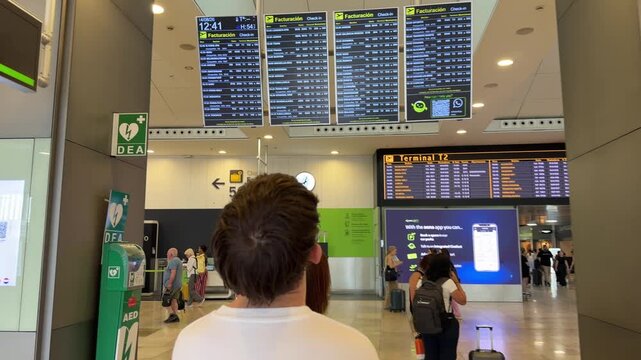 Passengers waiting in a modern airport terminal