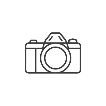 Minimalist vector line art icon of a modern DSLR camera isolated on a white background