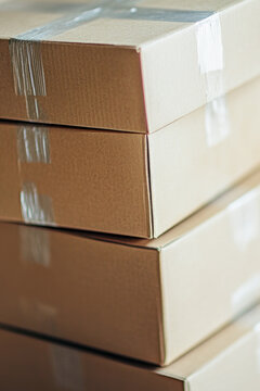 A stack of boxes stacked on top of each other. vertical frame