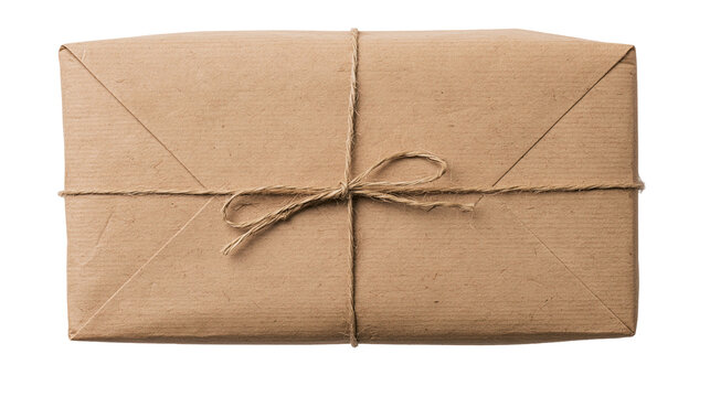 Isolated rustic brown paper parcel tied with natural twine string, ready for gifting or post.