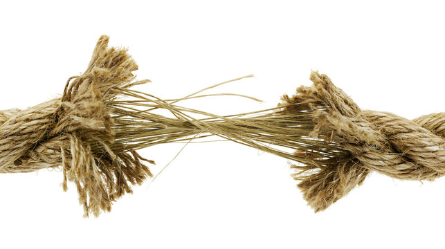 Isolated natural fiber rope fraying and breaking in the middle, symbolizing weakness and crisis