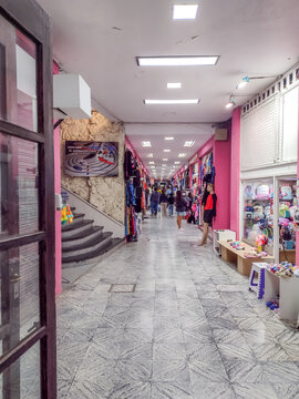 Indoor Corridor of a Commercial Shopping Gallery with Retail Stores