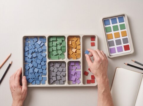 Analyst Reviewing Dataset Balance With Color-Coded Sample Groups