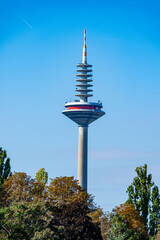 iconic high TV Tower stands tall against brilliant blue sky, city’s modernity and serving popular tourist attraction, modern communication, European city landmark and architectural urban background © kittyfly