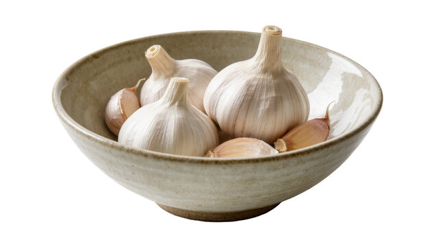 Rustic ceramic bowl filled with whole garlic bulbs and cloves, isolated on transparent background