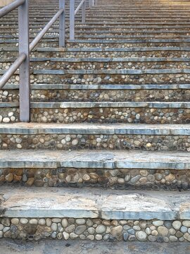 Stairs with decorative beach pebble finishing in Elche, Spain