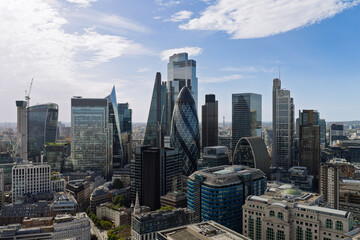 Obraz premium Modern Skyscrapers and Tall Office Buildings in the City of London Financial District During Daytime