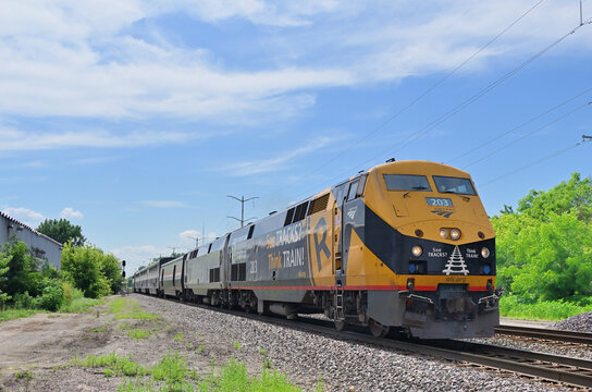 Amtrak's eastbound California Zephyr, led by a specially decorated locomotive, heralding Operation Lifesaver, rolling about 45 miles from the end of its journey from California to Chicago.