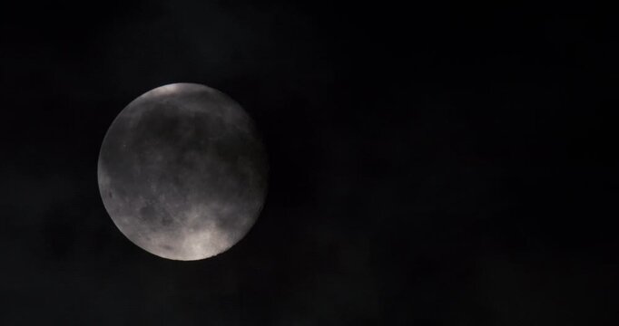 Moon phases captured at night in dark sky