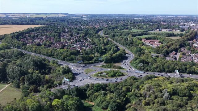 Drone Aerial Footage of Busy Roundabout Traffic in Basingstoke UK Road Infrastructure