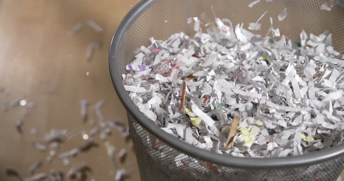 Shredded paper flying in slow motion detail