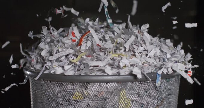 Shredded paper flying in slow motion