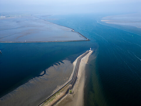 Aerial View of West-Terschelling showing the Pier and tidal mudflats, Terschelling, Netherlands