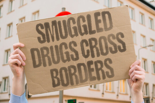 "Smuggled drugs cross borders" Narcotics trafficking networks move contraband through international checkpoints. SMUGGLING. NARCOTICS. TRAFFICKING. BORDER. CRIME.