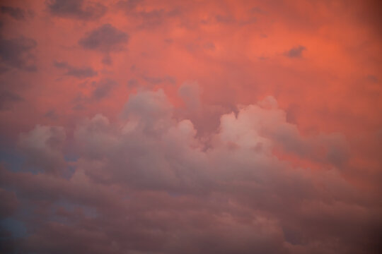 dramatic ember, red and orange sky with clouds during sunset