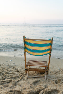 Beach chair overlooking the Pylon of Messina and Strait of Messina