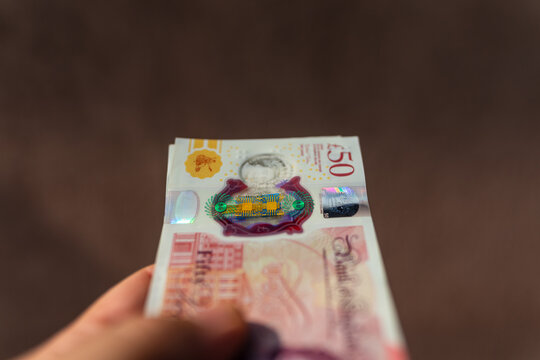 British pound sterling GBP banknotes representing United Kingdom currency finance banking and money concept