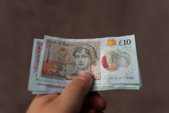 British pound sterling GBP banknotes representing United Kingdom currency finance banking and money concept