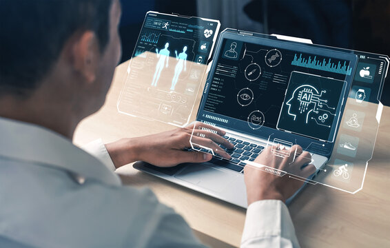 Person Using Laptop with Futuristic AI Technology Interface Displaying Data and Charts in Modern Office Environment. Bitwise.