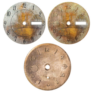 Isolated photo of steel rusty vintage worn clock or watch face on white background.