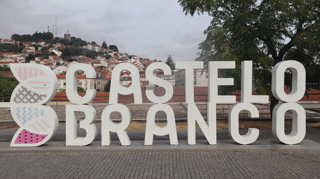 CASTELO BRANCO, PORTUGAL - AUGUST 22, 2026: General view of Castelo Branco city in the Beira Baixa region of central Portugal Castelo Branco large white letters sign with city skyline background