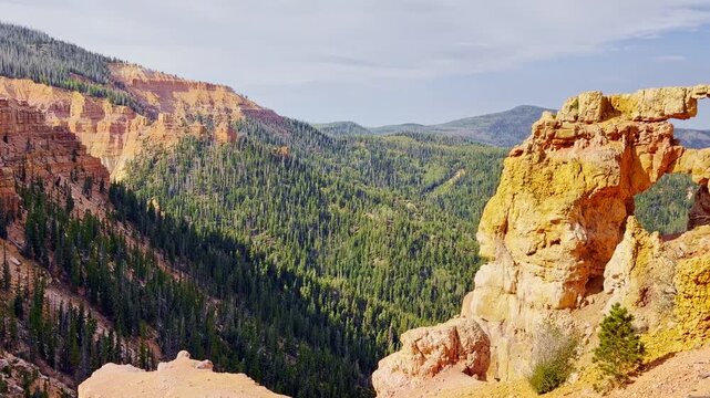 Sunrise over Bartizan double arch in Cedar Breaks
