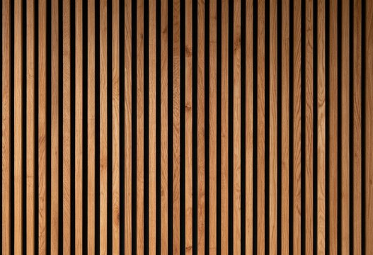 Vertical wooden slats with dark gaps creating a textured, rhythmic pattern