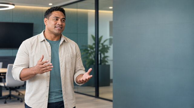 Professional man giving a presentation in a modern office