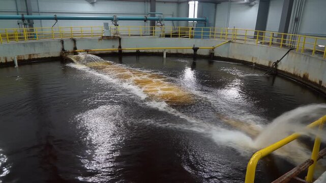 Oil separator tank with liquid across the surface